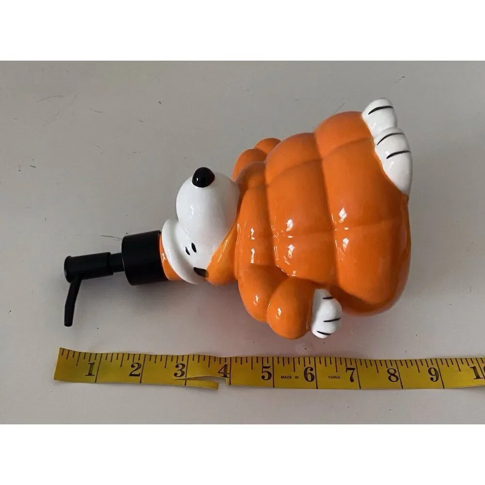 Peanuts Snoopy Soap‎ Lotion Dispenser Orange Quilted Puffer Puffy Jacket NEW